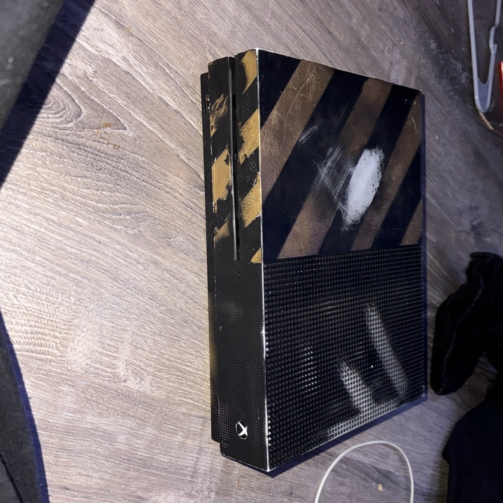 Xbox one s. Only the console and power cord.